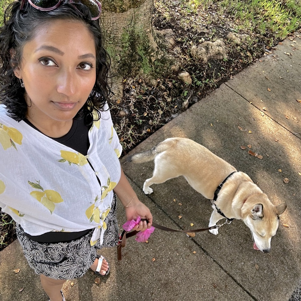 I'm a mom with a dog and some clothes. 🐕❤️